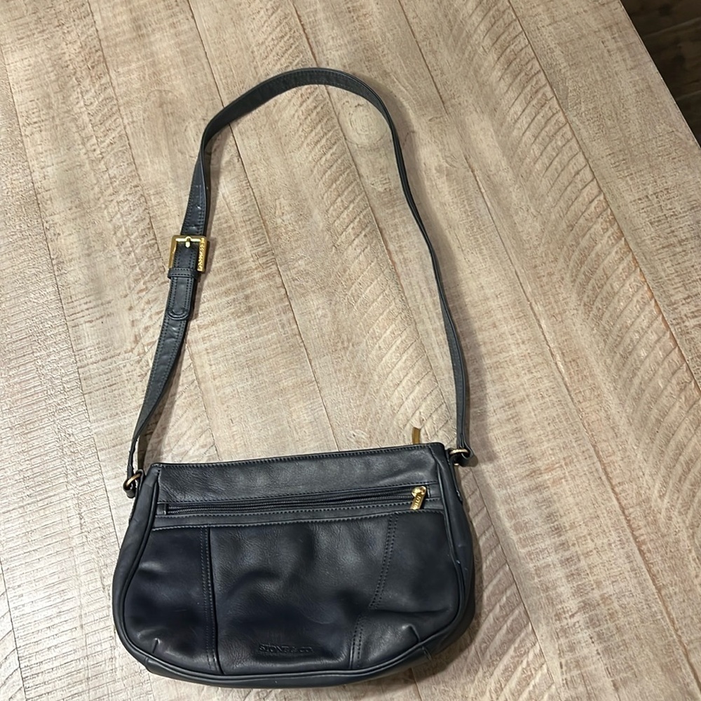 Black leather STONE & CO. purse.